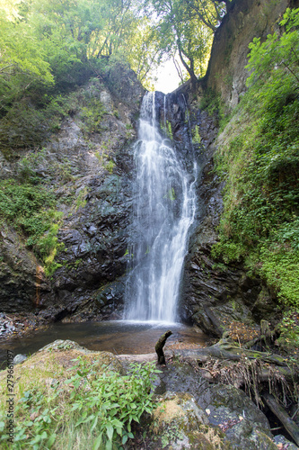 Pesegh Waterfall in the countryside of Varese, Northern Italy. Nobody is visible, only the waterfall and the river. photo