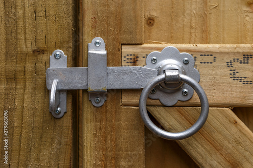 Metal Round Ring Latch Handle Fitted On Wooden garden gate photo