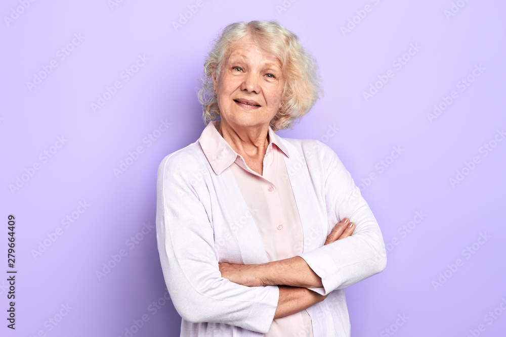 positive cheerful talented lady doctor with crossed arms posing confidently. isolated light blue background. studio shot. profession, occupation, job, lifestyle. positive cheerful talented lady doctor with crossed arms posing confidently. isolated light blue background. studio shot. profession, occupation, job, lifestyle.