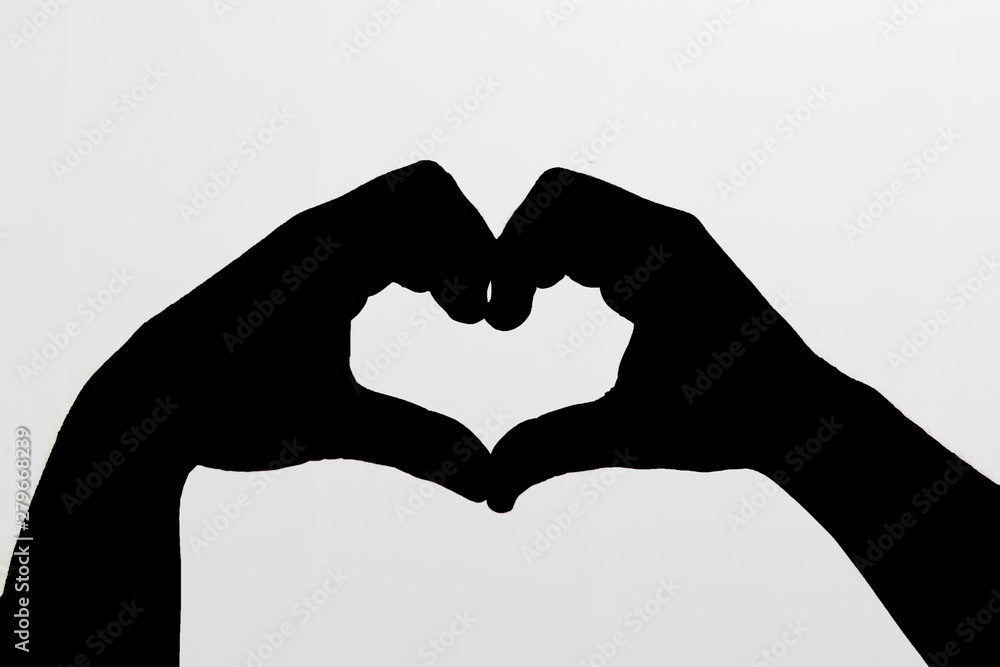 Obraz premium Heart shape made of two palms