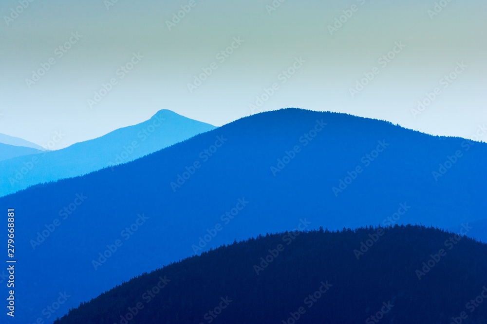 Fototapeta premium Fog enshrouded mountain range, Stowe Vermont, USA