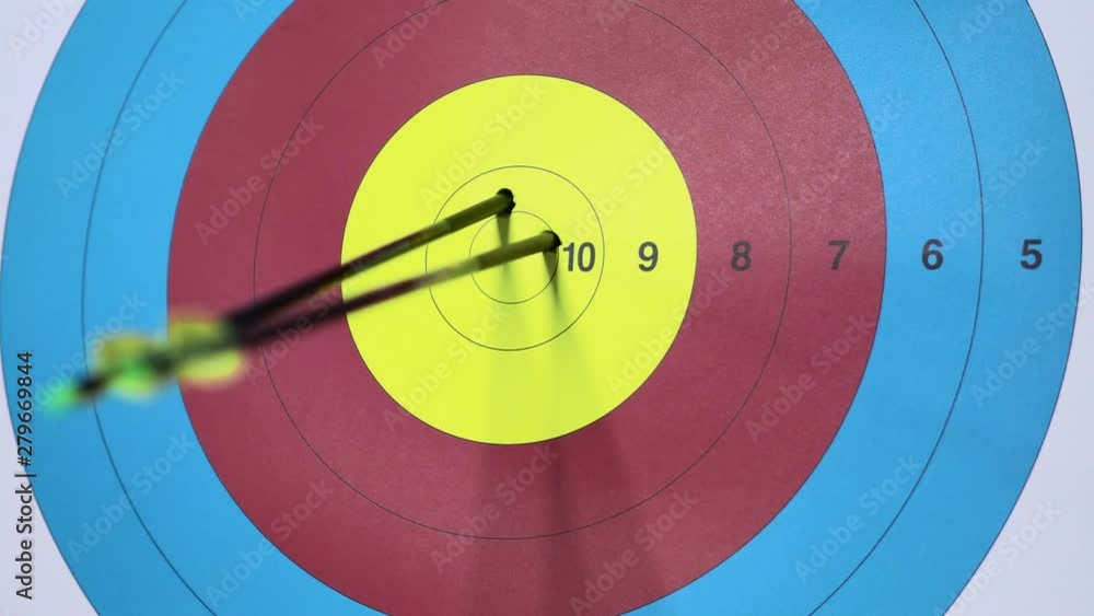 Three rrows hits on target. Ten. Close up video Three rrows hits on target. Ten. Close up video