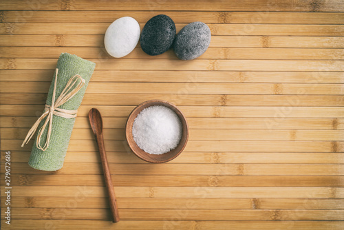 Canvas Print Bath salts natural spa products top view on bamboo wooden texture background with copy space for wellness health concepts