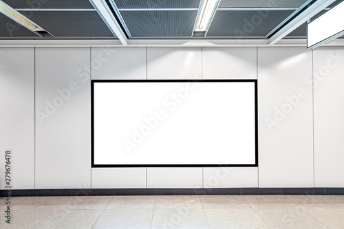 Blank advertising display in subway station underpass public area