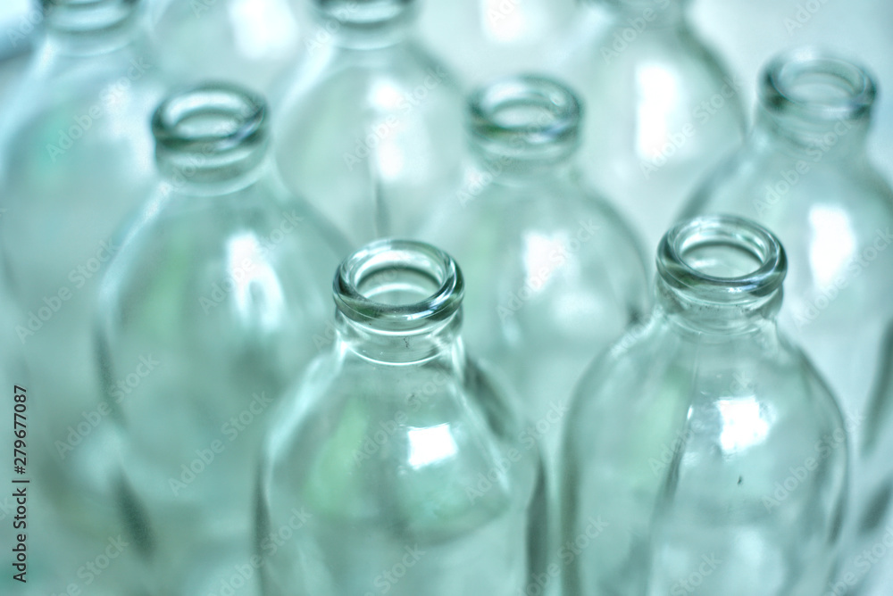 Group of reuse bottles glass on the ground. Group of reuse bottles glass on the ground.