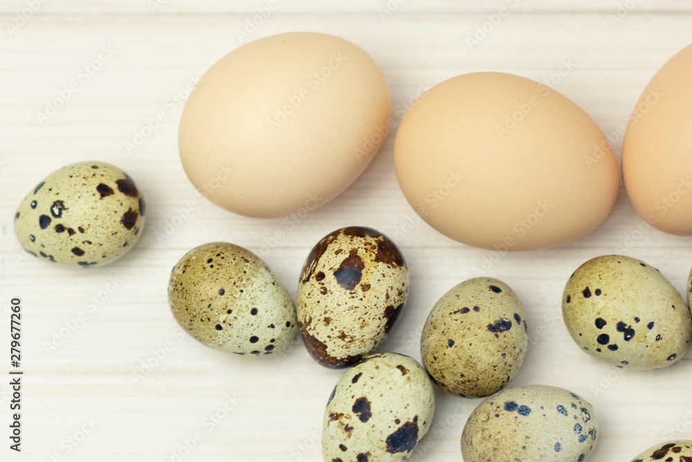 Organic eggs, farm on a wooden background close-up. Open space, healthy food concept, plants, soil, organic natural products, natural food, vegetarian dishes, vegetables, raw, food festival