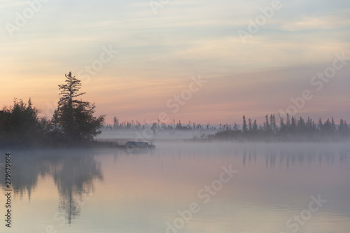 Dawn mist over lake