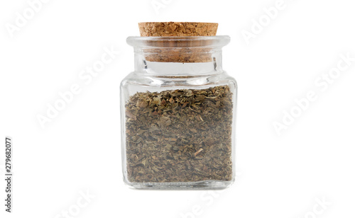 mint leaves in glass  jar on isolated on white background. front view. spices and food ingredients.