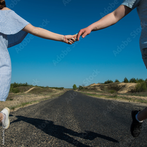 Pair of Lovers Goes Hand in Hand.