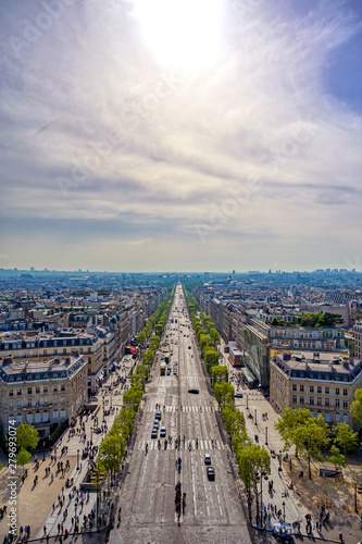 A view of Paris, France from the Arc de Triomphe on a sunny day.