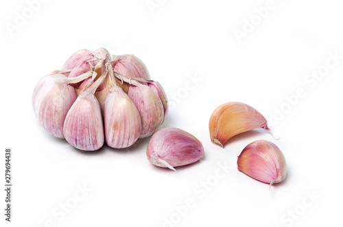 Garlic bulb and garlic cloves isolated on white background. Fresh garlic closeup.