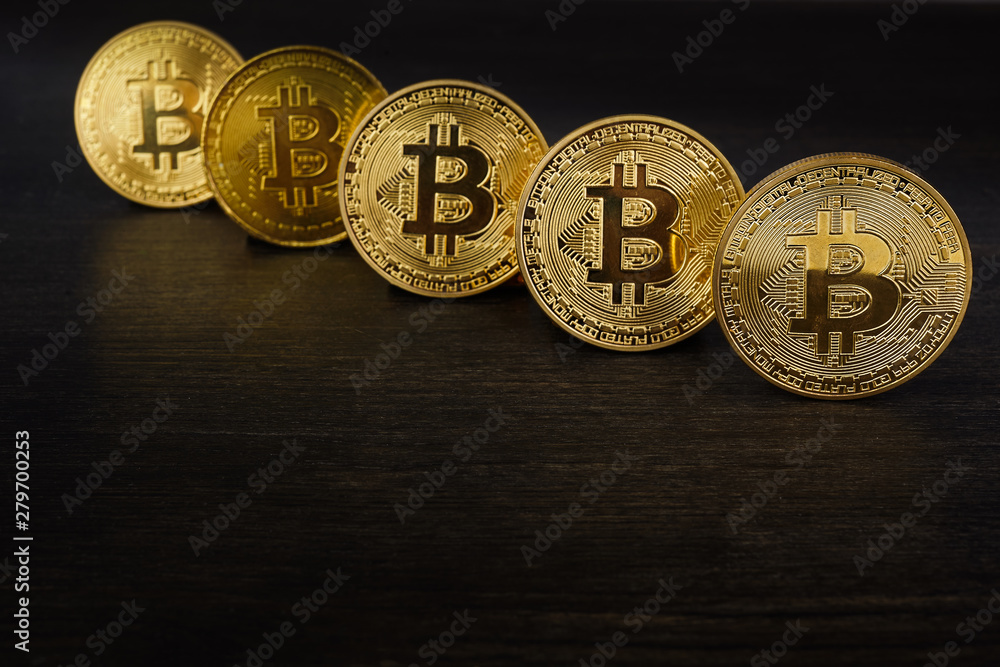 Golden Bitcoin on dark backround. New virtual money. Crypto currency Golden Bitcoin on dark backround. New virtual money. Crypto currency