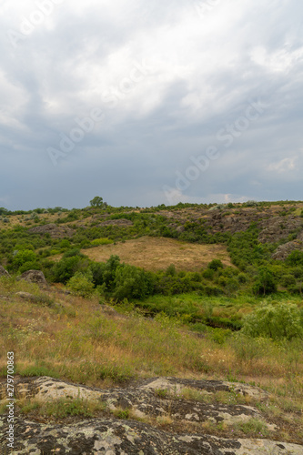 Large granite canyon. Village Aktove. Ukraine. Beautiful stone landscape.