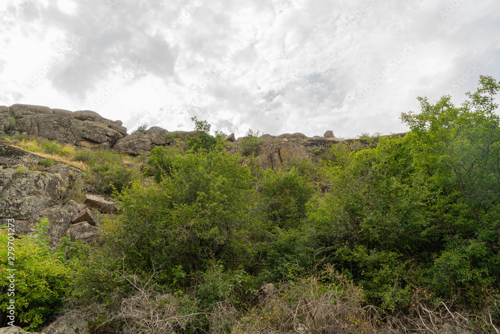 Large granite canyon. Village Aktove. Ukraine. Beautiful stone landscape.