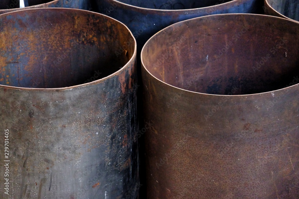 Close up a group of old rusty metal tanks for background texture Close up a group of old rusty metal tanks for background texture