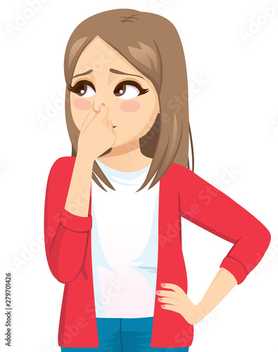 Young teenager woman pinching nose feeling bad smell