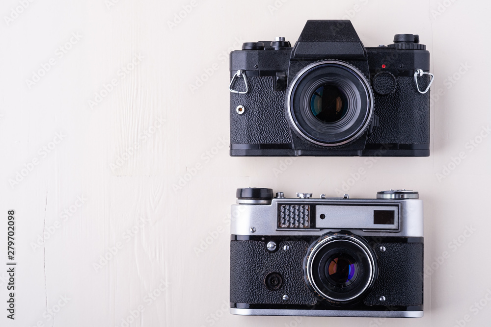 Old vintage retro two photo film camera copy space top view flat lay on white background