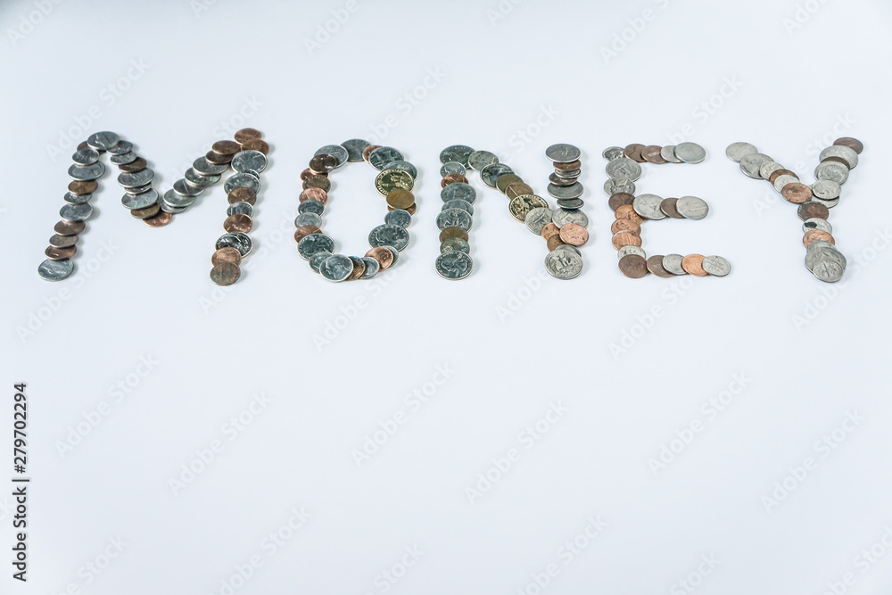 Coins isolated on solid white background spelling the word Money Coins isolated on solid white background spelling the word Money