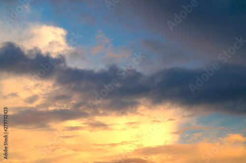 Large white cumulus clouds on a blue sky for background or ecology or nature. © Vlad Savin