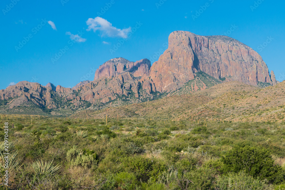 Desert landscape view of the Chisos Basin during the day in Big Bend National Park (Texas). Desert landscape view of the Chisos Basin during the day in Big Bend National Park (Texas).