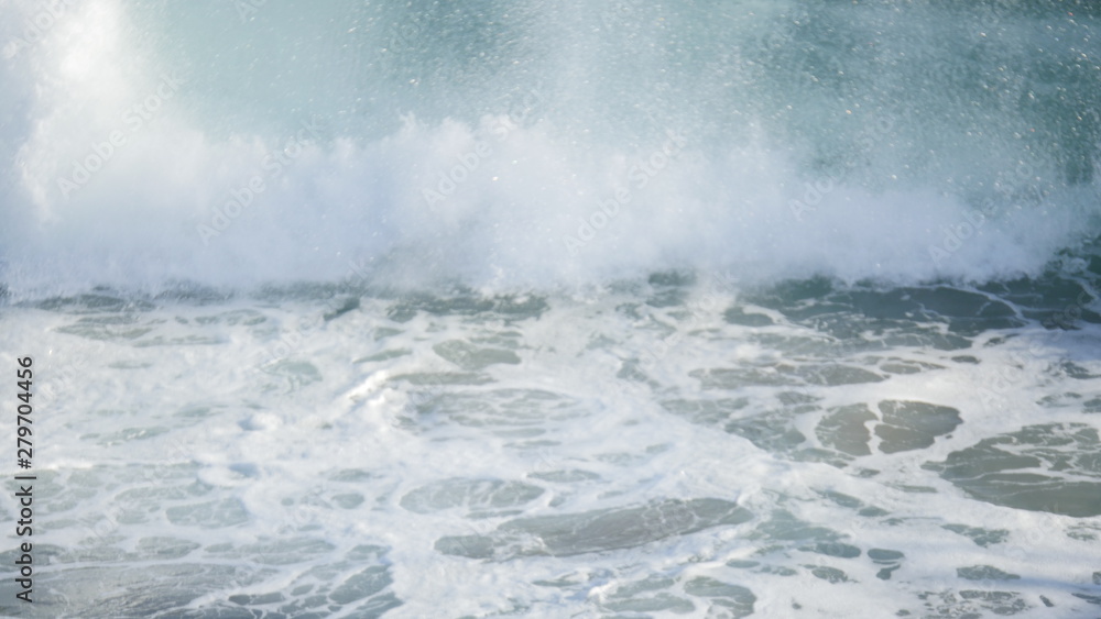 Obraz premium Beach with waves crashing at the ocean shot in high resolution 4k resolution