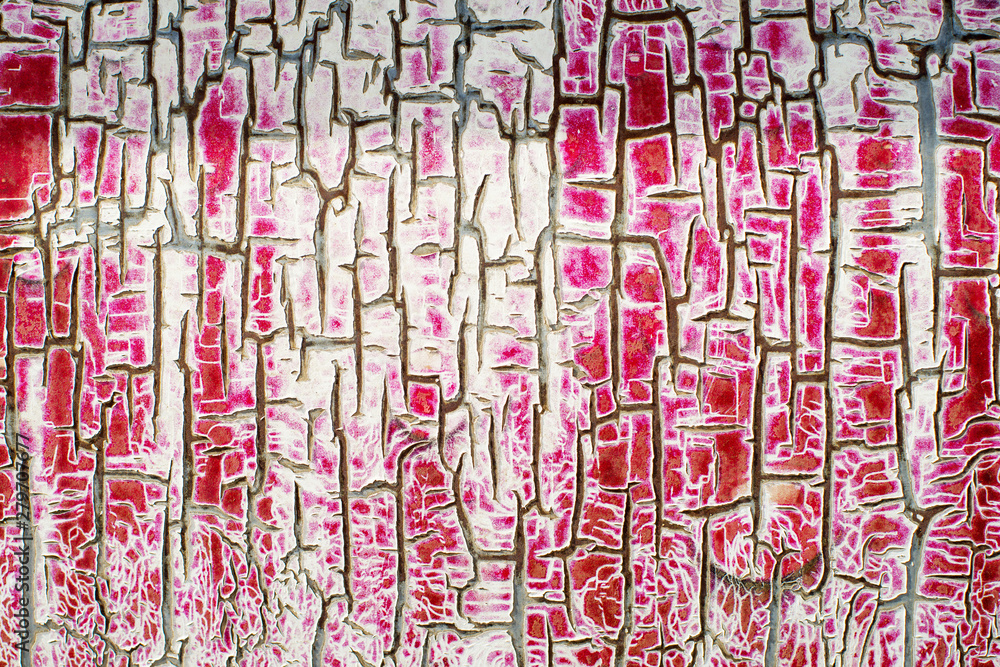 Obraz premium Cracks grunge background. Abstract red background