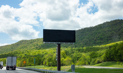 Billboard blank on a highway for advertisement, spring sunny day