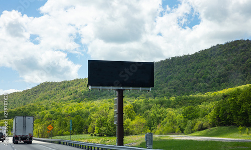 Billboard blank on a highway for advertisement, spring sunny day