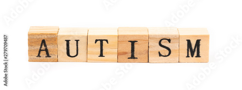 autism word written with wooden cubes
