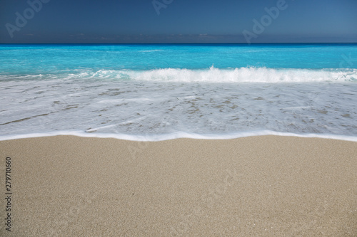 Sandy beach with white sand and turquoise sea water on the island of Lefkada, Greece