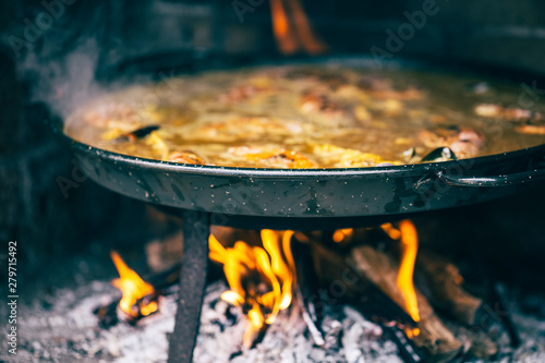 Typical spanish paella in the fire