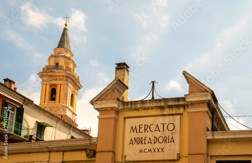 Close-up of the sign of Mercato Andrea Doria, an old roofed market selling local products in the ancient fishing borough of Oneglia, Imperia, Liguria, Italy photo