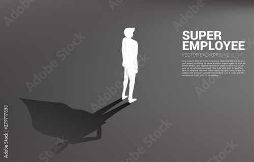 Silhouette of businessman with briefcase and his shadow of superhero.concept of empower potential and human resource management