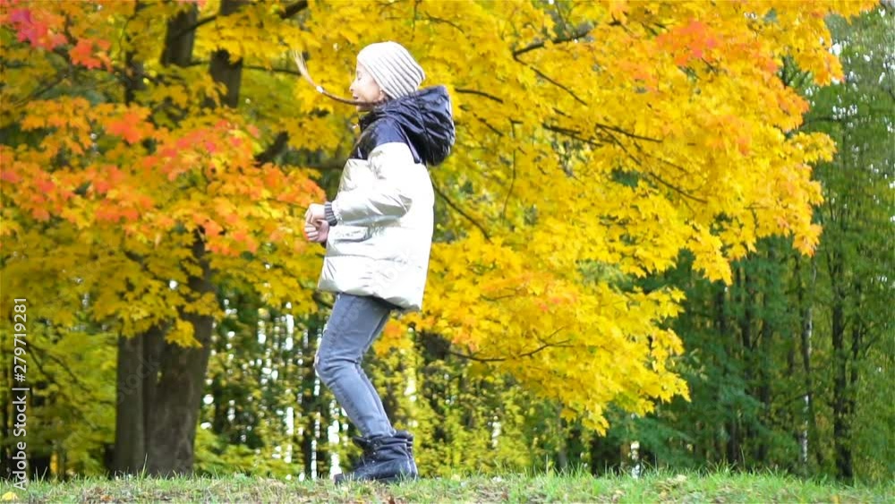 Portrait of adorable little girl with yellow leaves bouquet in fall Portrait of adorable little girl with yellow leaves bouquet in fall