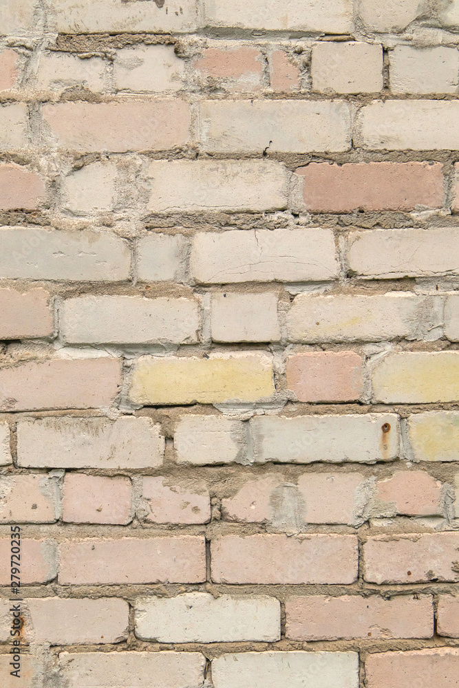 textured, expressive wall of light-colored bricks textured, expressive wall of light-colored bricks