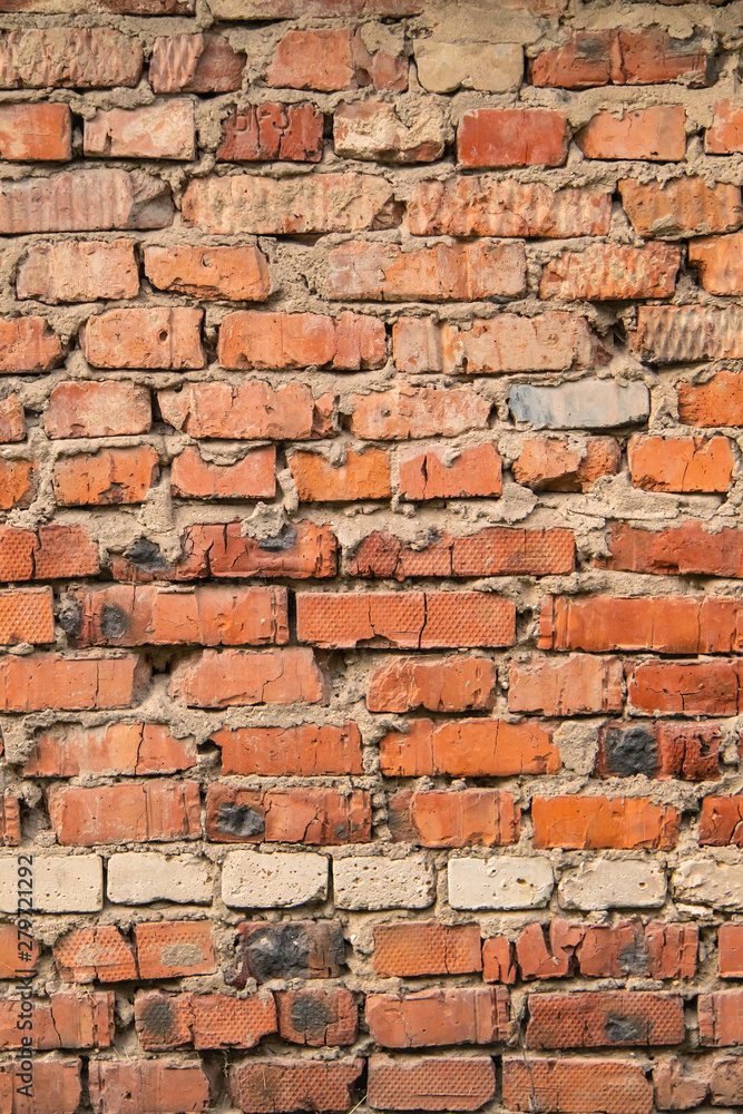 Obraz premium textured, expressive wall of red bricks