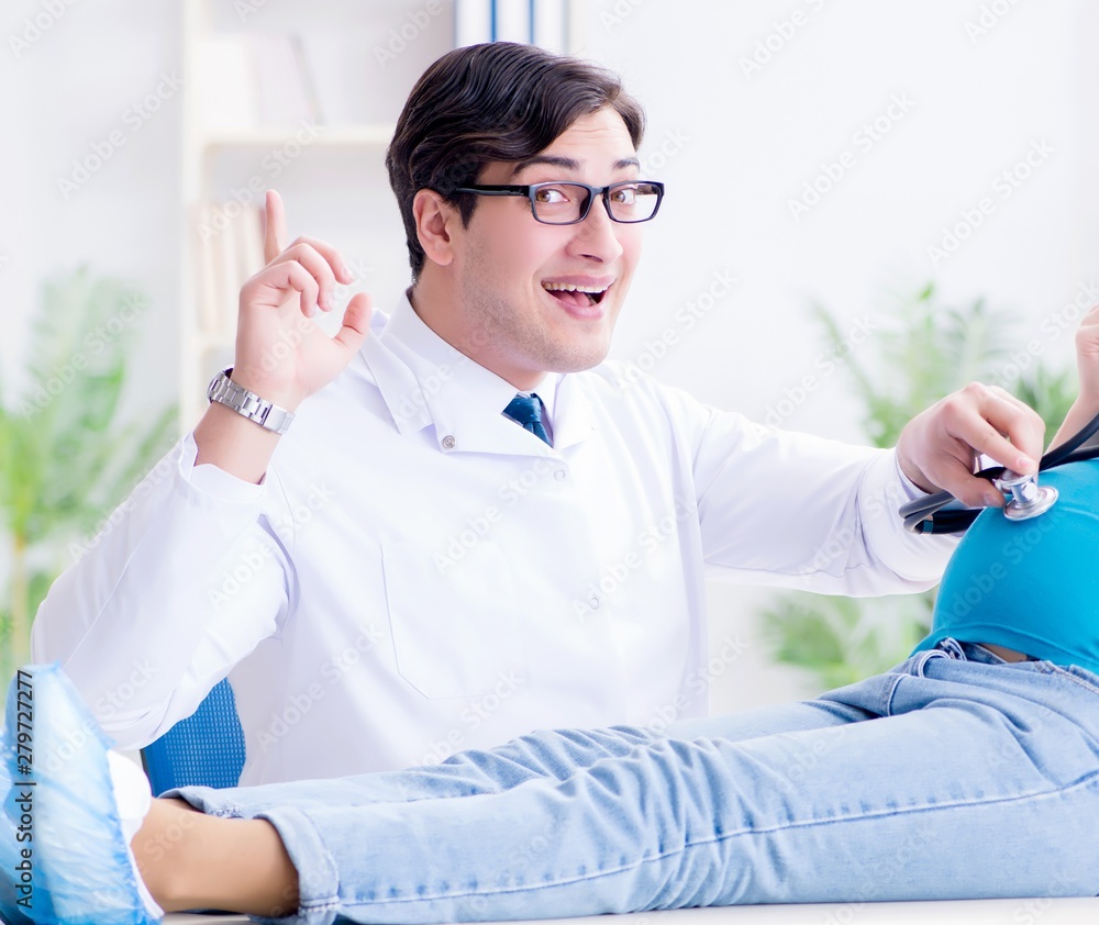 Doctor examining pregnant female patient in hospital Doctor examining pregnant female patient in hospital