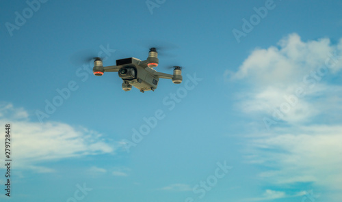 Fototapeta Naklejka Na Ścianę i Meble -  Small Drone on the blue sky 