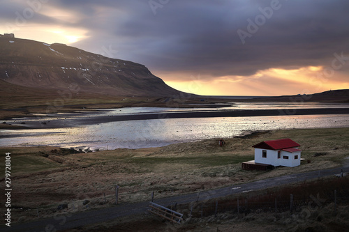 Beautiful scenery of natural from meadow and mountains during sunset in Iceland.