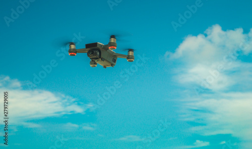 Fototapeta Naklejka Na Ścianę i Meble -  Small Drone on the blue sky 