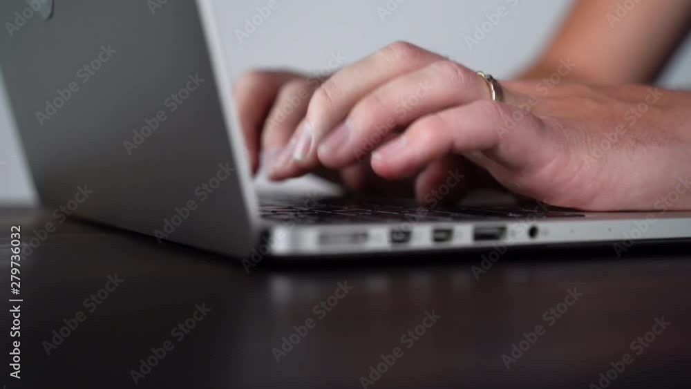 Close up of Caucasian Man Typing on Laptop for College Paper Close up of Caucasian Man Typing on Laptop for College Paper