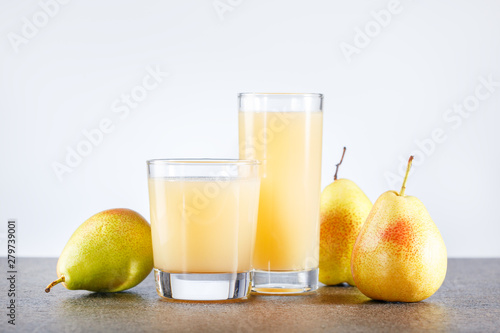 Pear Juice with fresh fruits on the table. Healthy drink and food.