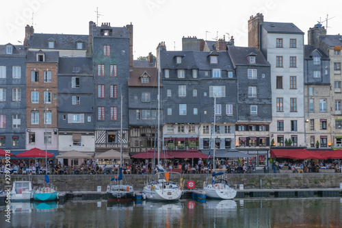 Honfleur, France - 06 01 2019: Panoramic view of the harbor at sunset