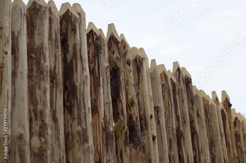 log fence, new, unpainted, natural wood