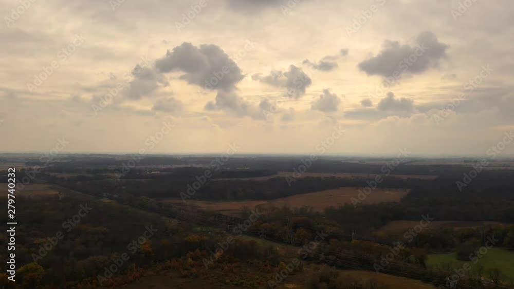 Time-lapse of rural countryside and cloud formations, aerial view Time-lapse of rural countryside and cloud formations, aerial view