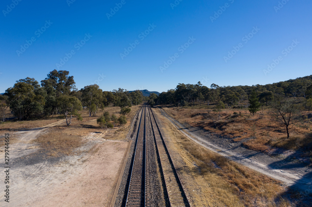 Railway tracks heading into the Australian outback. Railway tracks heading into the Australian outback.