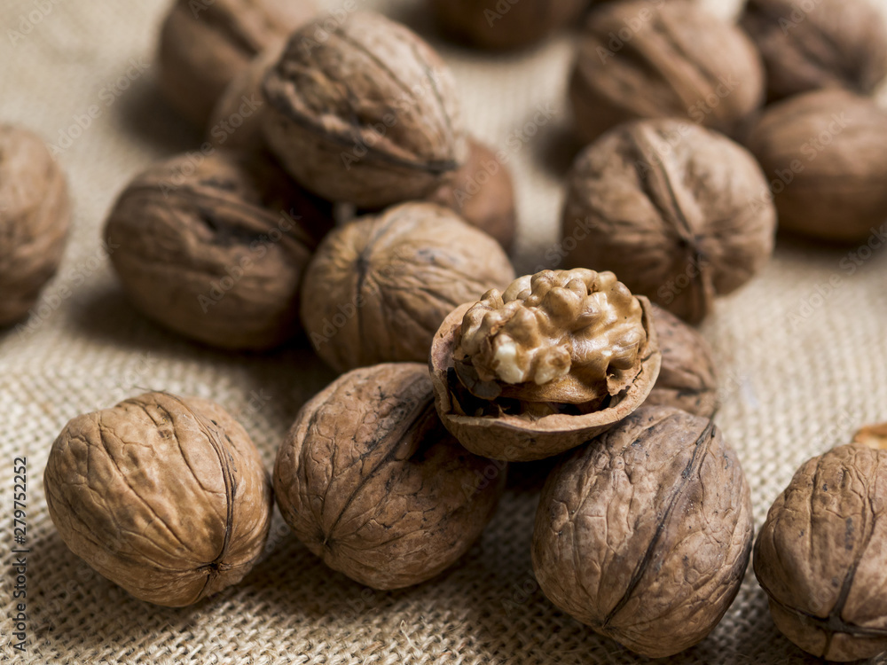 Group of nuts on brown background Group of nuts on brown background