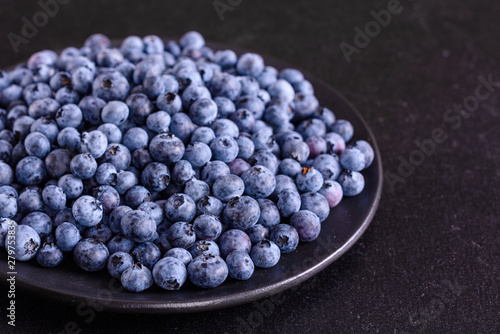 Blueberry antioxidant organic superfood in a bowl concept for healthy eating and nutrition