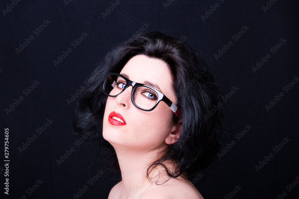Image of a beautiful young woman wearing glasses