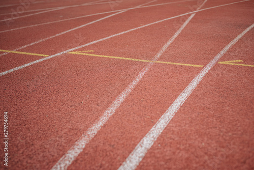 Sport. A red treadmill or athletics track at the stadium. Copy space